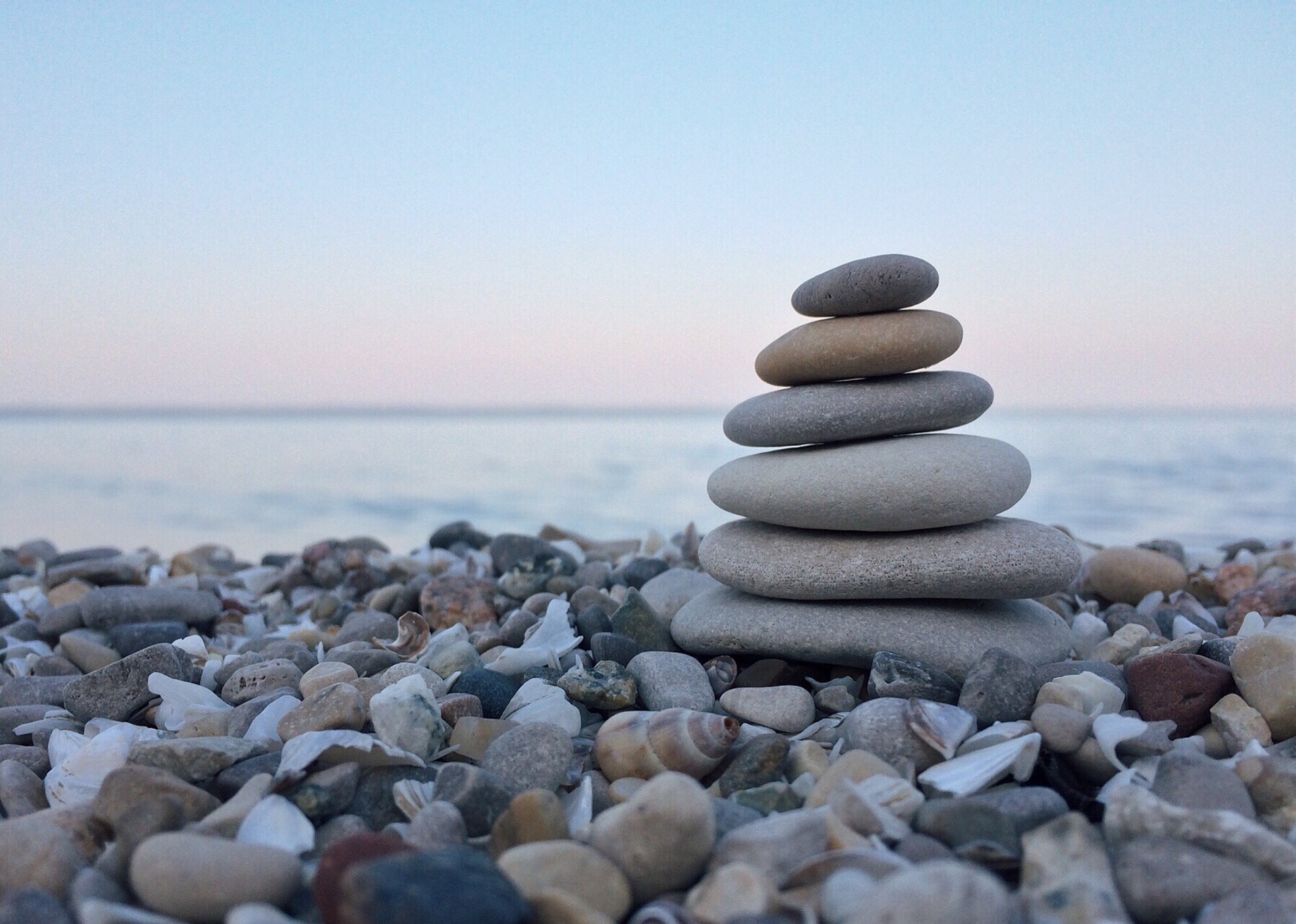 Harmony stones symbolizing peaceful resolution through separation agreements, a service offered by our Maryland divorce lawyer